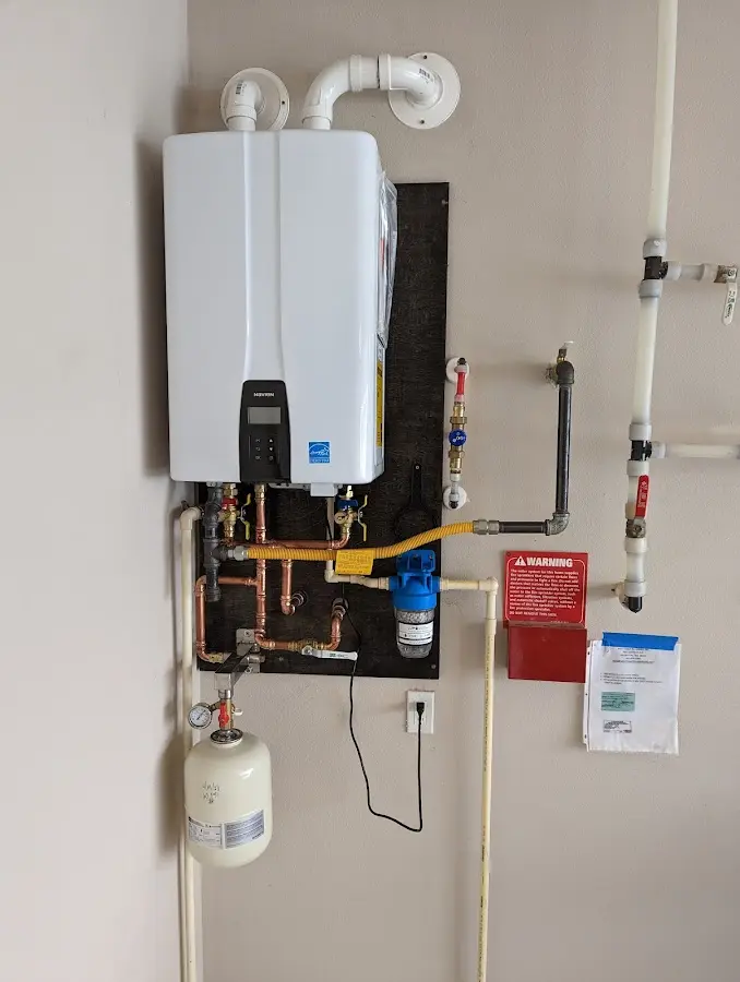 Professional plumber installing copper piping in a Castaic home